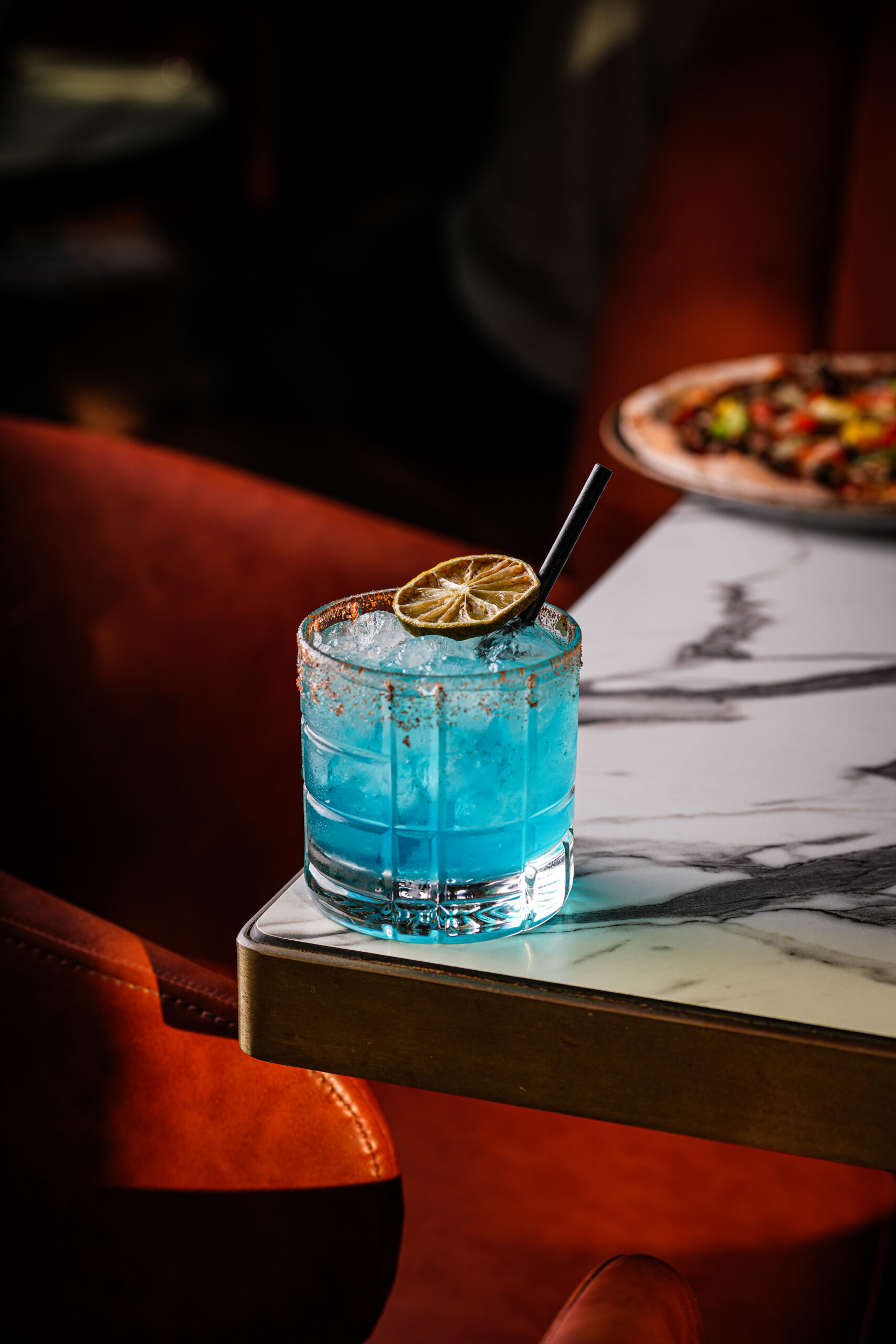 A salted, chilli-rimmed cocktail on the table at Citi Terrace